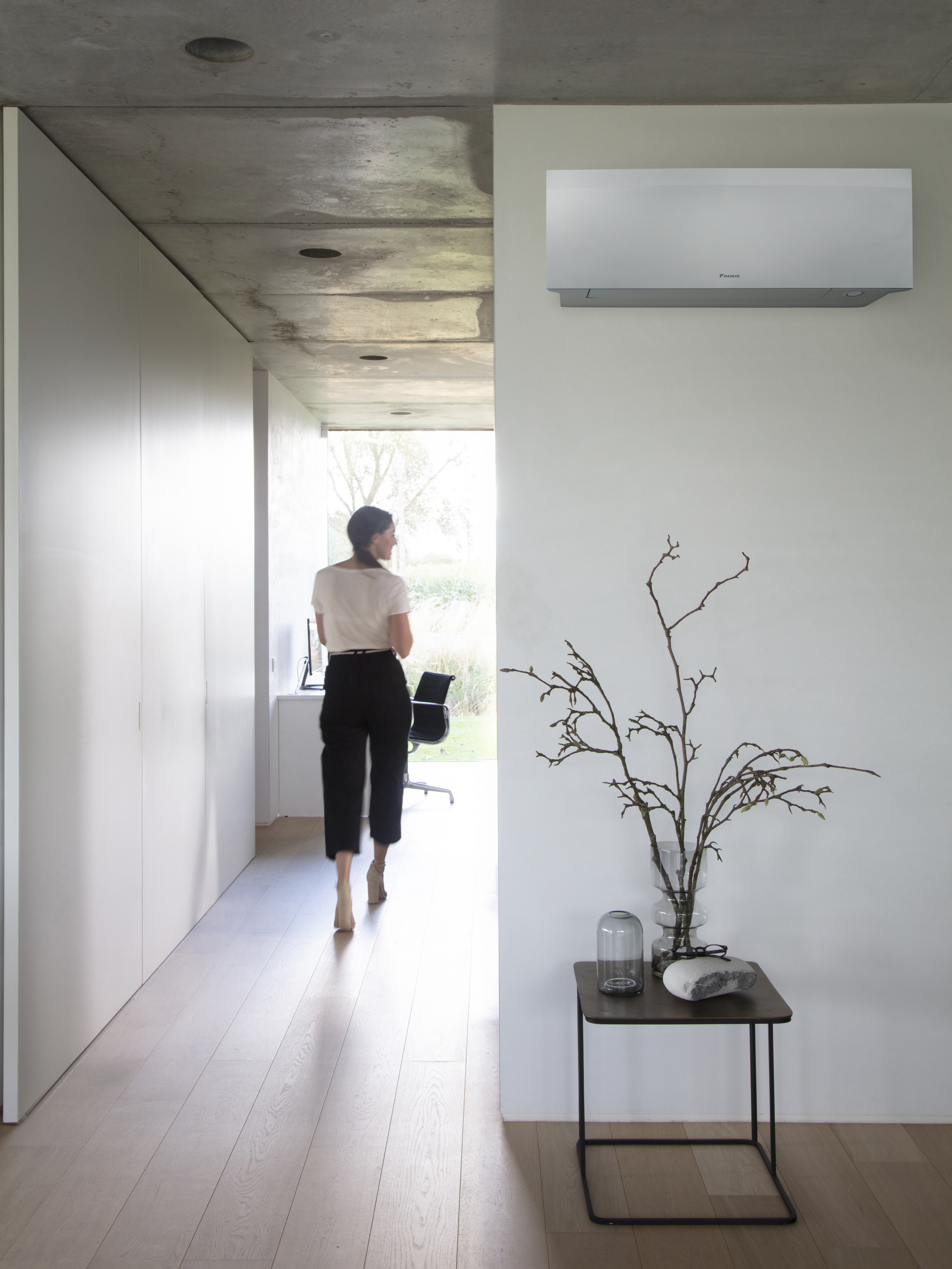 Stulish interior featuring a wall-mounted air conditioning unit