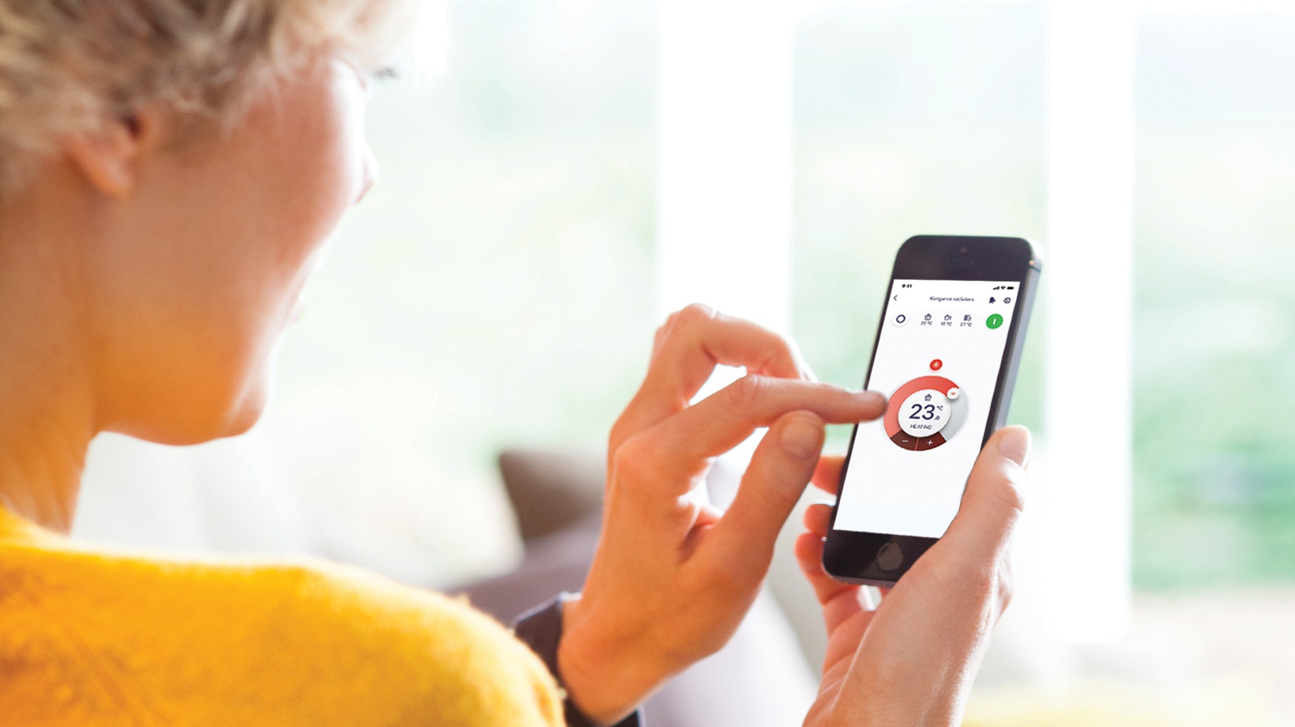 Woman using the Onecta app on her smartphone