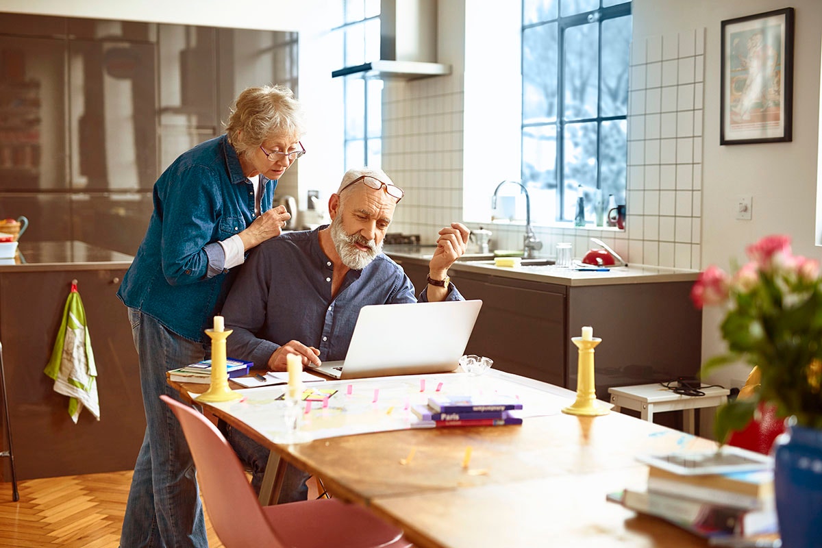 Couple looking at laptop