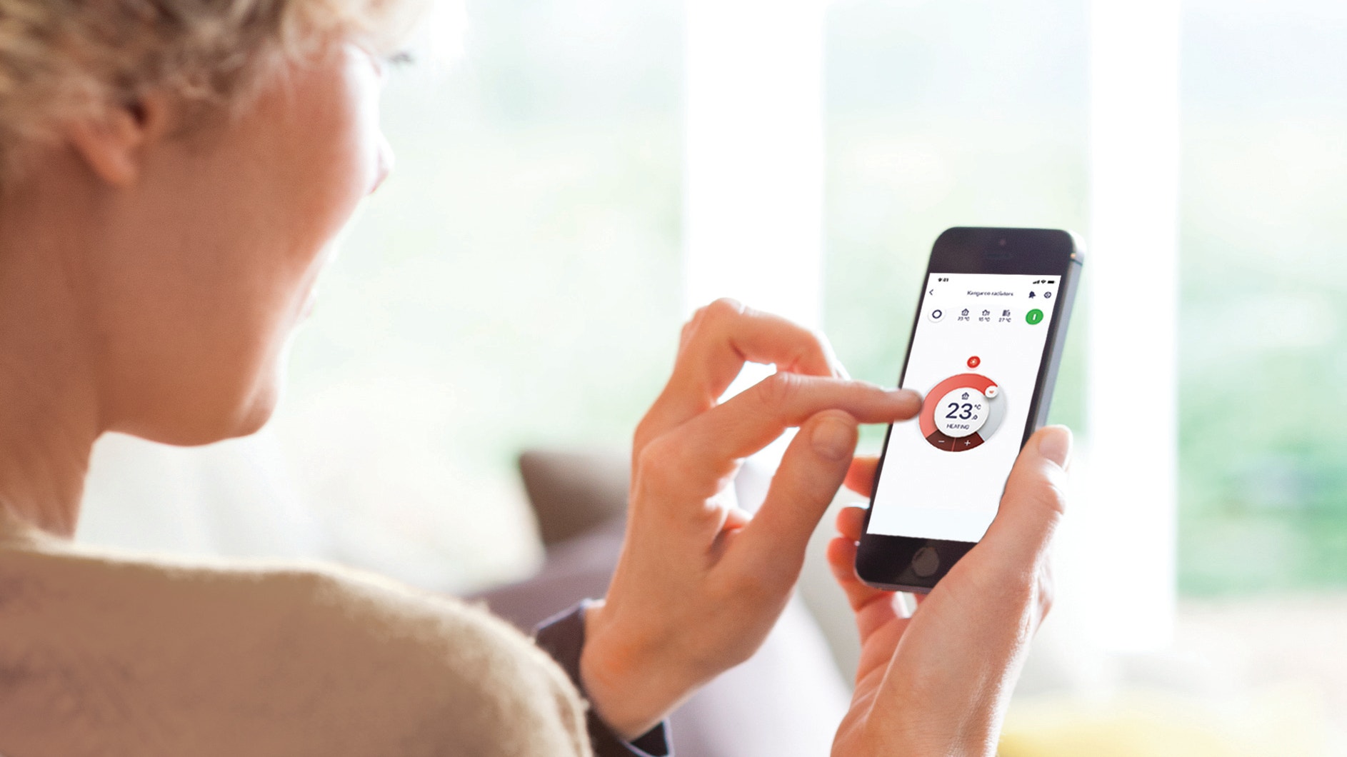 Woman using the Onecta app on her smartphone