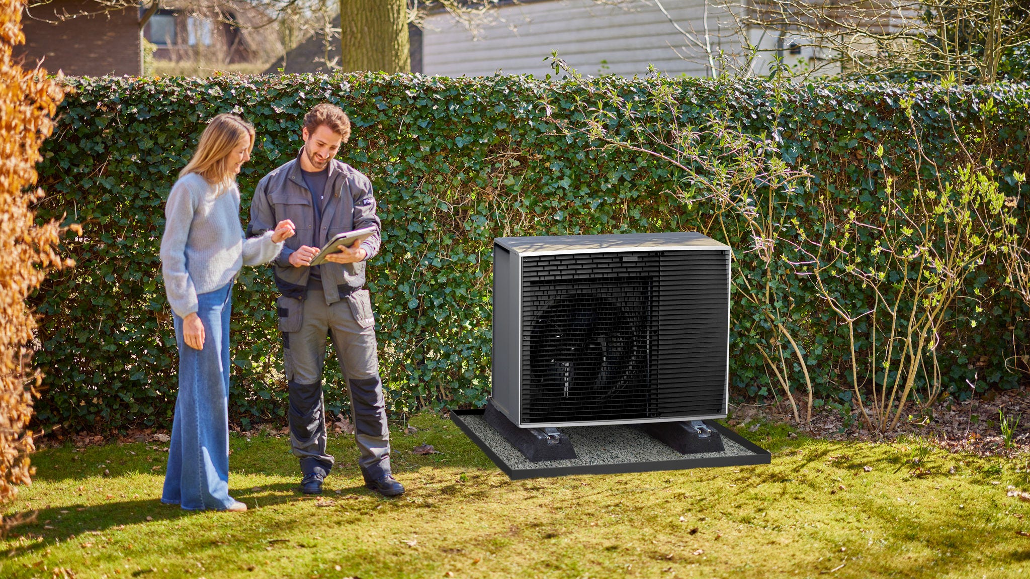 Air-to-water heat pump outdoor unit installation in residential garden